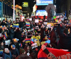 Venezuelan Americans take to Times Square to protest on behalf of their country's citizens who are fighting against President Nicolas Maduro's government.