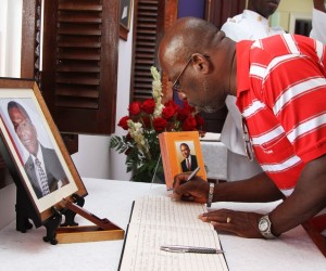 Trinidadians paying respect to A.N.R. Robinson