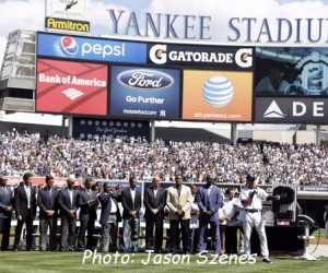 New York Yankees captain Derek Jeter (R) acknowledges the crowd in front of NBA hall of fame player Michael Jordan (C-L), hall of fame player Cal Ripkin, Jr. (2nd from left) and former yankee players during a ceremony honoring him on his retirement from baseball during 'Derek Jeter Day' before the start of the Kansas City Royals vs the New York Yankees at Yankees Stadium in the Bronx, New York, USA, 07 September 2014. Derek Jeter will retire at the end of the season. (Jason Szenes image)