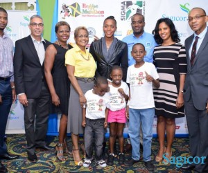 At Left, Sagicor's CEO Richard Byles between Neil Watson and A. Cecile Watson, Founders..  Alia Atkinson, Event Patron in middle.  Others are Beneficiary representatives from Jamaica Kidney Kids Foundation and Cornwall Regional Hospital Neonatal Unit.