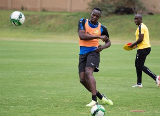 usain-bolt-tires-for-soccer-place