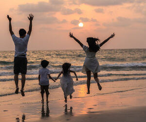 Caribbean Business And Finance Report family-on-beach