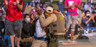 police-embrace-protestors