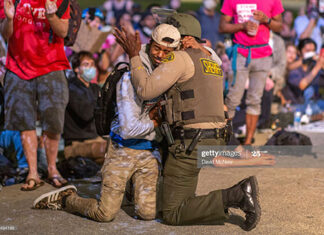 police-embrace-protestors