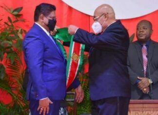 Convicted Murderer Bouterse Peacefully Hands Over Power In Suriname suriname-power-transfer