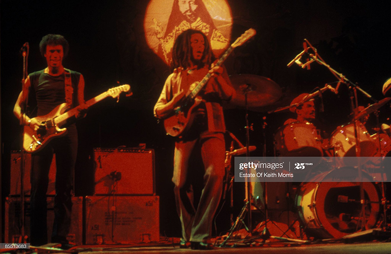 bob-marley-playing-guitar bob-marley-playing-guitar