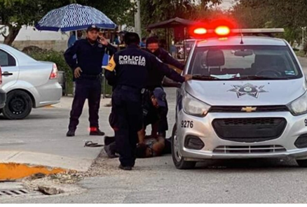 mexico-george-floyd-incidentThe video shows a woman prone, handcuffed body lying on the road. Officers are later seen moving the limp, shoeless body into the back of a police truck.