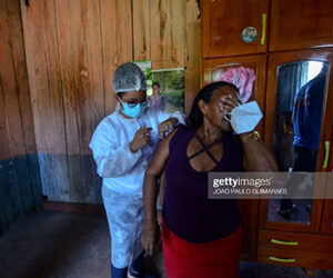woman-gets-vaccine-in-brazil