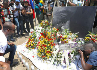 Haitians Protest, Pay Tribute haitians-pay-tribute-to-president