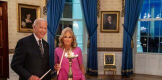 president-biden-lights-a-diya