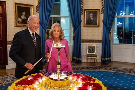 president-biden-lights-a-diya president-biden-lights-a-diya