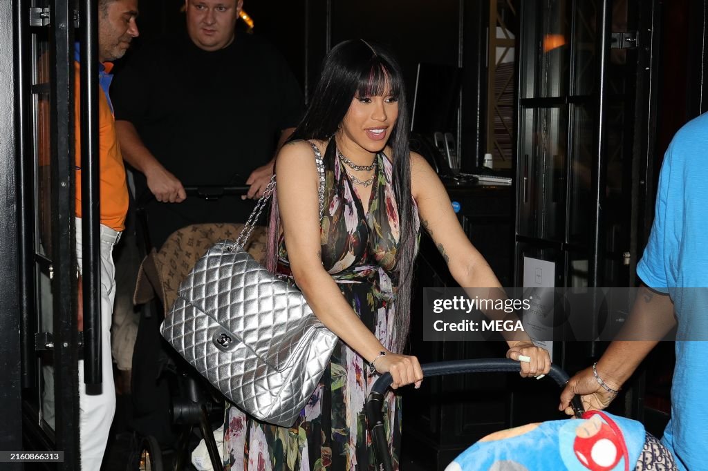 cardi b is seen leaving Cesar restaurant