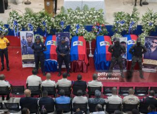 People attend funeral ceremony of four Haitian police officers