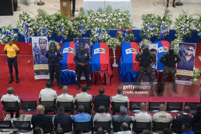 four-police-officers-recently-slain-in-haiti People attend funeral ceremony of four Haitian police officers