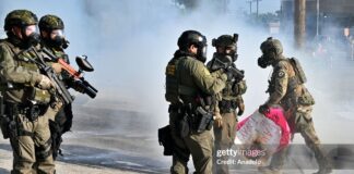 ICE officers clash with demonstrators in Chicago