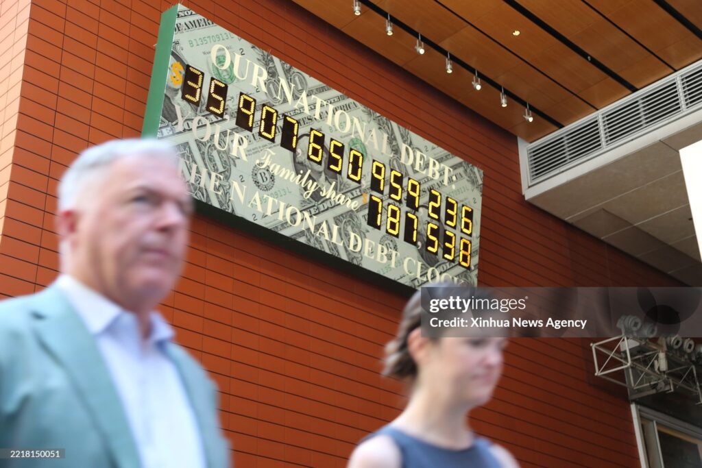 us-national-debt-clock-ticks-on