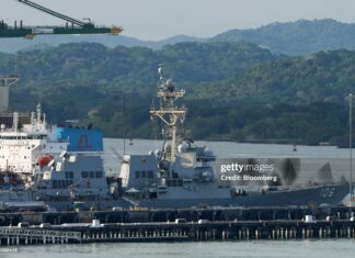 US Ramps Up Naval Presence In The Caribbean The US Navy's USS Stockdale, an Arleigh Burke-class guided-missile destroyer, docked at the Frigate Captain Noel Antonio Rodriguez Justavino Naval Base, near entrance to the Panama Canal in Panama City, Panama, on Saturday, Sept. 20, 2025. Last week, US President Donald Trump said the US military had knocked off a third drug boat from Venezuela, despite the Pentagon so far only detailing two such strikes. Photographer: Enea Lebrun/Bloomberg via Getty Images