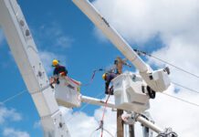 Island Grid BGC Working on the Distribution System