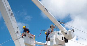 Island Grid BGC Working on the Distribution System