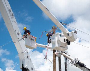 Island Grid BGC Working on the Distribution System