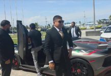 Guyanese businessman Azruddin Mohamed pulled up a the swearing in with a Lamborghini.