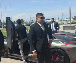 Guyanese businessman Azruddin Mohamed pulled up a the swearing in with a Lamborghini.