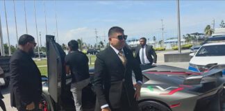 Guyanese businessman Azruddin Mohamed pulled up a the swearing in with a Lamborghini.