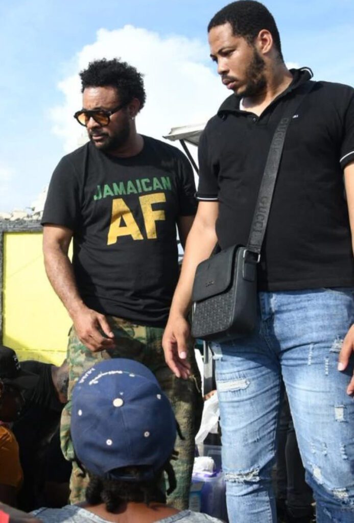 shaggy-hands-out-donations-in-black-river-jamaica