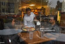 Ethiopians On TPS Given 60 Days To Leave US Ethiopian restaurant workers serve customers in Washington, D.C., highlighting the everyday lives of Ethiopian immigrants affected by the termination of TPS.