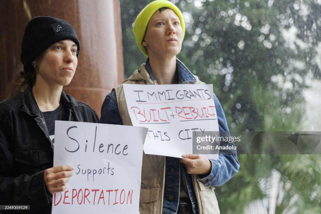 Demonstrators protest ICE detentions during the New Orleans City Council delay amid Trump’s nationwide immigration sweep, Louisiana, December 2025.