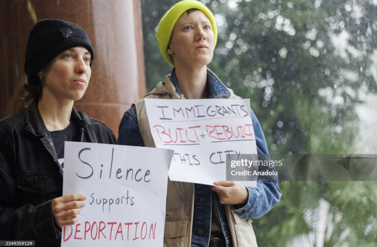 Demonstrators protest ICE detentions during the New Orleans City Council delay amid Trump’s nationwide immigration sweep, Louisiana, December 2025.