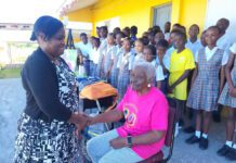 A Tribute To Potters’ Queen Of Education – Teacher Gen Retired Antiguan educator Teacher Gen being honored at Potters Village as students and community members look on.