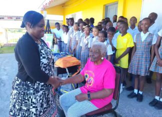 A Tribute To Potters’ Queen Of Education – Teacher Gen Retired Antiguan educator Teacher Gen being honored at Potters Village as students and community members look on.
