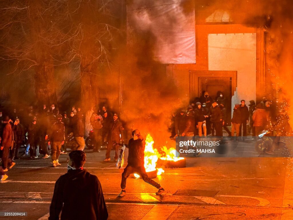 Iranians gather while blocking a street during a protest in Tehran, Iran on January 9, 2026.