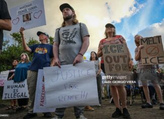 Demonstrators protest against Immigration and Customs Enforcement (ICE) and demanding the closure of the immigrant detention center known as "Alligator Alcatraz" outside the center at the Dade-Collier Training and Transition Airport in Ochopee, Florida, on January 11, 2026. A US Immigration and Customs Enforcement (ICE) agent shot and killed 37-year-old Renee Nicole Good on the streets of Minneapolis on January 7, leading to huge protests and outrage from local leaders who rejected White House claims she was a domestic terrorist.