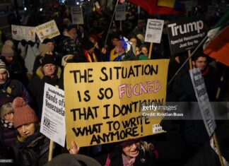 Hundreds of protesters turned out at the Hands Off Venezuela demonstration in response to the United States of America's actions in Venezuela on the 5th of January 2026, London, United Kingdom. The US attacked Venezuela on the 3rd of January and captured President Maduro and his wife Celia Flores in a highly controversial military action, which critics have suggested is illegal and in breach of international conventions. (photo by Kristian Buus/In Pictures via Getty Images)