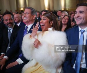 Musician Nicki Minaj laughs during remarks by U.S. President Donald Trump