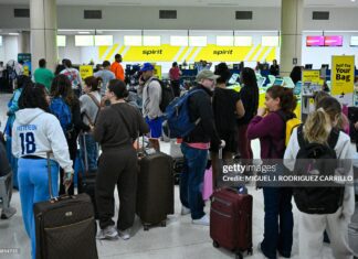 Caribbean Airspace Closure Trigger Mass Flight Cancellations As Regional Tensions Rise passengers-at-puerto-rico-airport-amid-cancellations-jan-3-2026