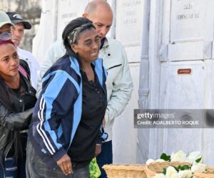 Relatives of some of the 32 Cuban soldiers killed during the US incursion in Venezuela pay respects at their graves during their funeral at Colon cemetery in Havana on January 16, 2026. The capture by US forces of Venezuelan leader Nicolas Maduro on January 3, 2026, and the killing in the operation of 32 Cubans assigned to protect him represent a major blow for the island's revered intelligence services, experts say.