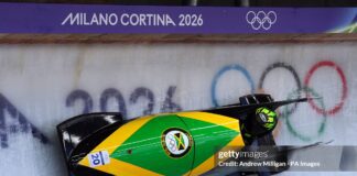 Jamaica's Mica Moore during the Women's Monobob Bobsleigh Heat 1 at the Cortina Sliding Centre, on day nine of the Milano Cortina 2026 Winter Olympics, Italy