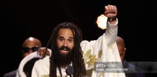 Keznamdi Wins 2026 Reggae Grammy As Caribbean Artists Turn Spotlight on Immigration Jamaican musician Keznamdi accepts the Grammy for Best Reggae Album for "BLXXD & FYAH" on stage during the 68th Annual Grammy Awards Premiere Ceremony at the Crypto.com Arena in Los Angeles on February 1, 2026.