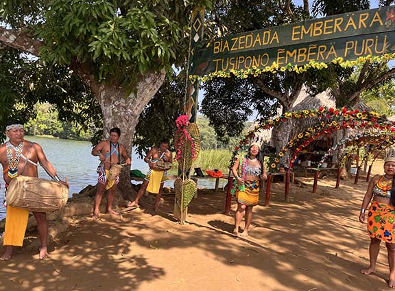 Embera people welcome tourists in song at their village up the Chagres River in Panama (NewsAmericasNow.com image)