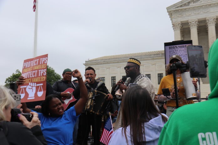 advocates-rally-for-haitians-outside-the-supreme-court 350,000 Haitian Immigrants Face Uncertain Future as Supreme Court Weighs TPS Case