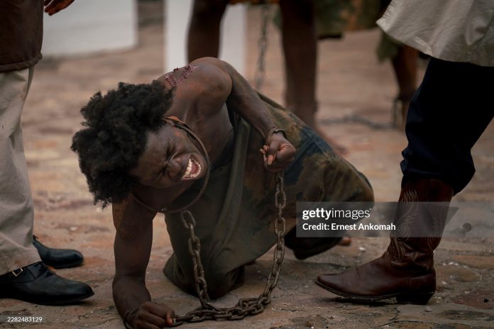 performers-reenact-slavery-at-ghana-call-for-reparations As Africa and the Caribbean adopt a 19-point reparations framework in Accra, historian Brooke Newman's "The Crown's Silence" proves the British monarchy directly designed and profited from Caribbean slavery