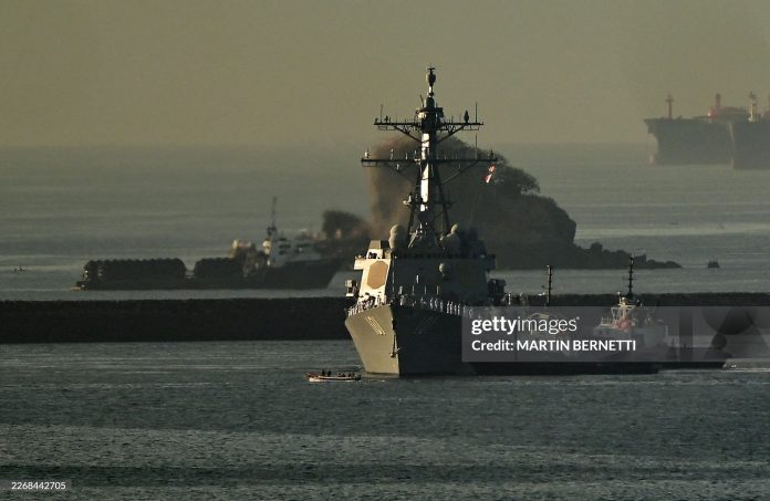 The Trump administration has launched 63 military strikes on suspected drug boats since September 2025 — with dozens of strikes occurring directly in Caribbean waters. Legal experts call them illegal extrajudicial killings.